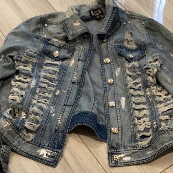 Distressed Denim Jacket with Studs